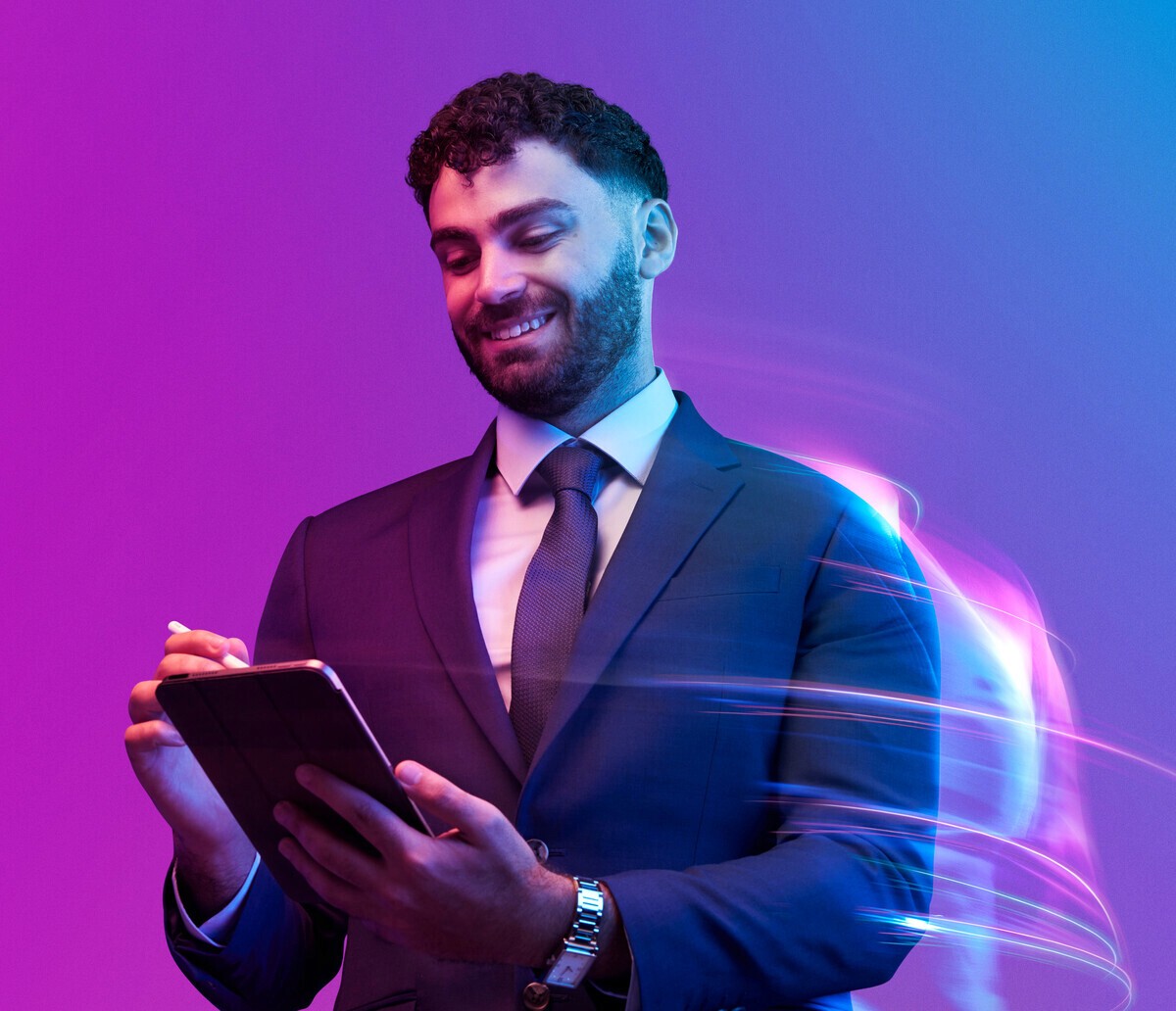 A store advisor using a tablet with a customer